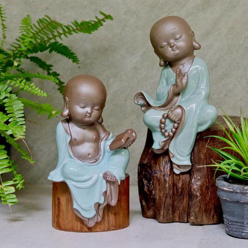 Ceramic Buddhist Monk Figurine with Book