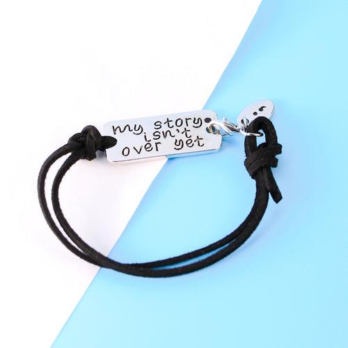 MY STORY ISNT OVER YET Motivational Quote Leather Bracelet