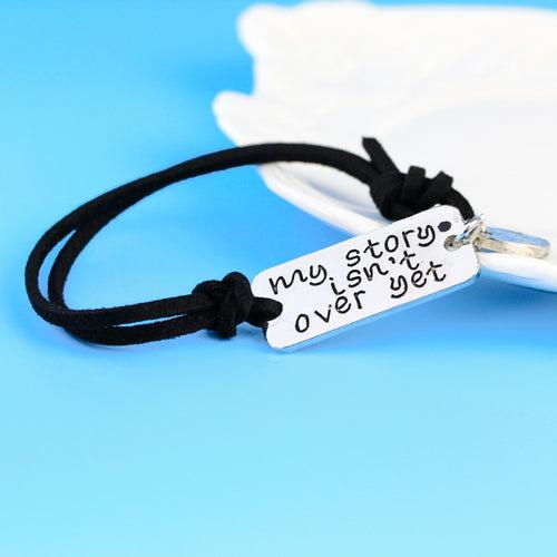 MY STORY ISNT OVER YET Motivational Quote Leather Bracelet