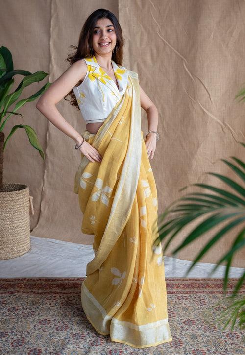 Yellow Floral Butti Dabu Linen Silver Zari Border Saree