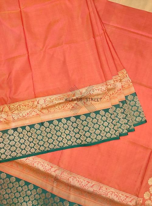Peach Katan silk Handwoven Banarasi saree with floral skirt border