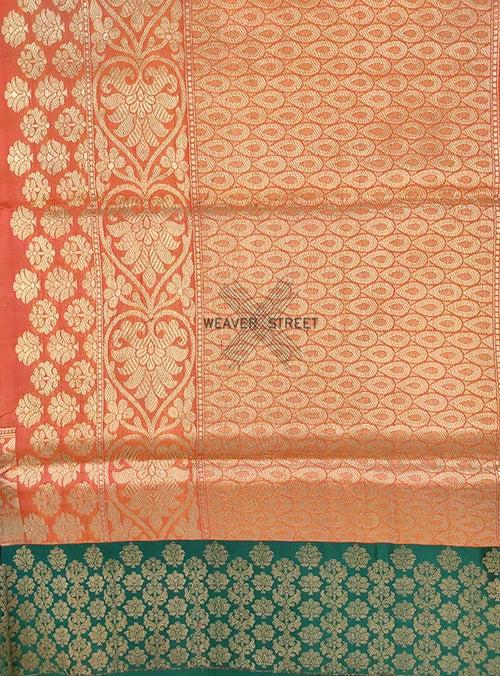 Peach Katan silk Handwoven Banarasi saree with floral skirt border