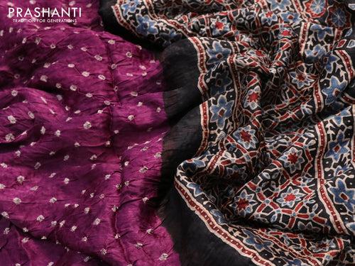 Modal silk saree purple and black with allover bandhani prints and ajrakh printed pallu