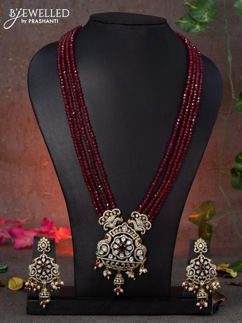 Beaded multi layer maroon necklace peacock design with pink kemp & cz stones and beads hanging in victorian finish