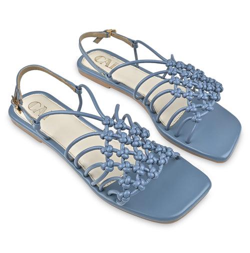 Blue puzzled flats