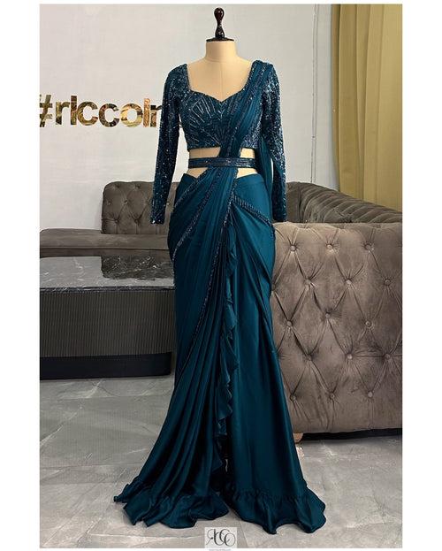 Teal frilled crystal saree with beaded top