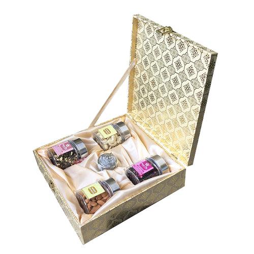 4 Glass Jars Wooden Box containing Tea & Nuts along with candle/infuser