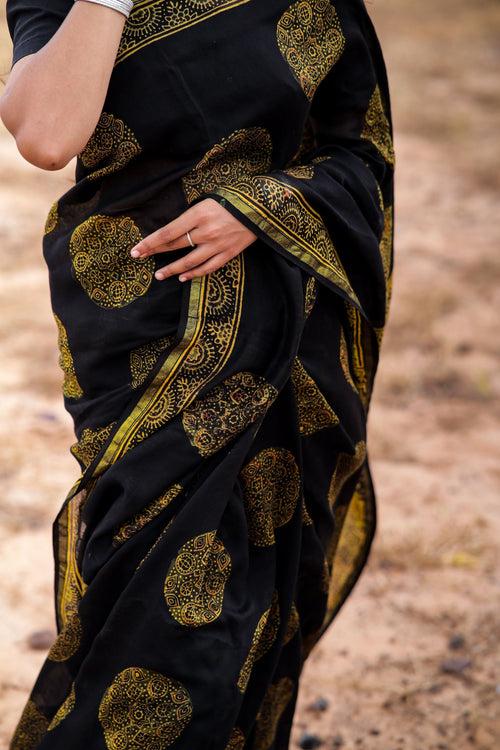 Jharokha -Black and green floral silk cotton Ajrakh handblockprinted saree