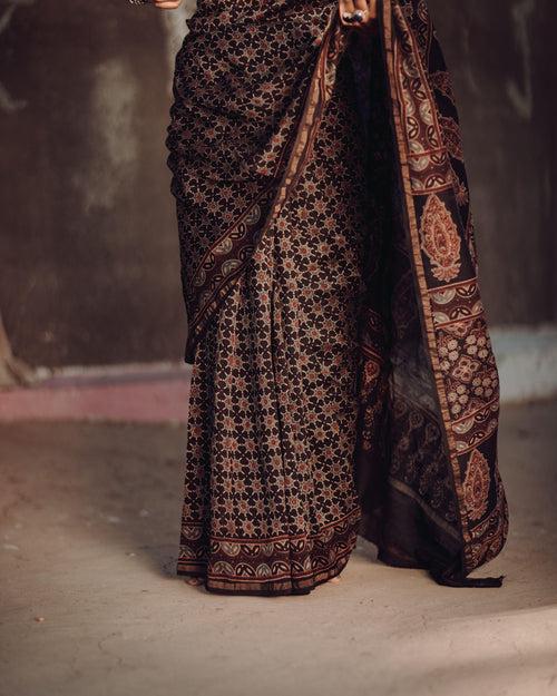 Jharokha -Black silk cotton Ajrakh handblockprinted saree