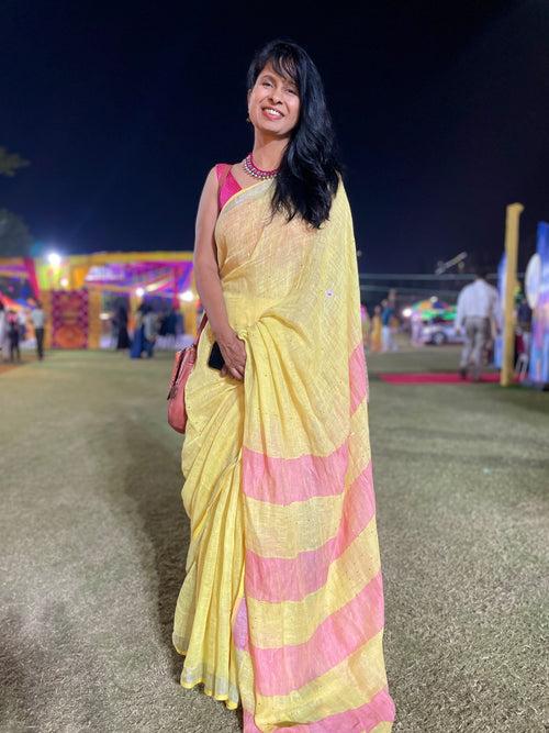 Handwoven Linen yellow saree with woven sitara