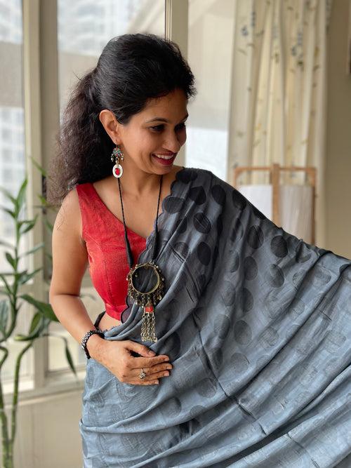 Modal voile self designed grey saree - with semi silk green BP