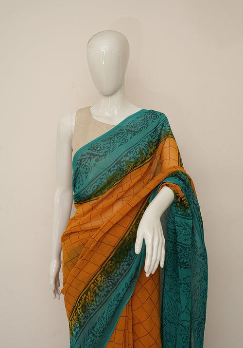 Mango Yellow and Teal Green Georgette Saree with Badla Work